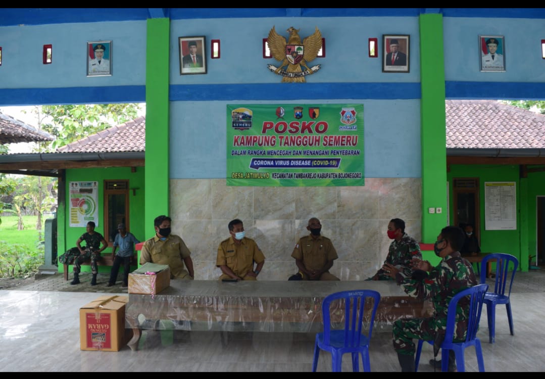 Penyerahan Buku Pinjam Pakai dalam Kegiatan TMMD